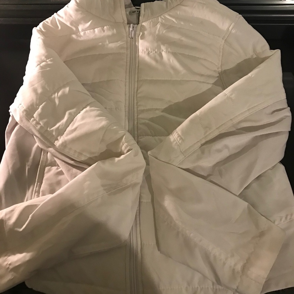 white puffy zip up jacket